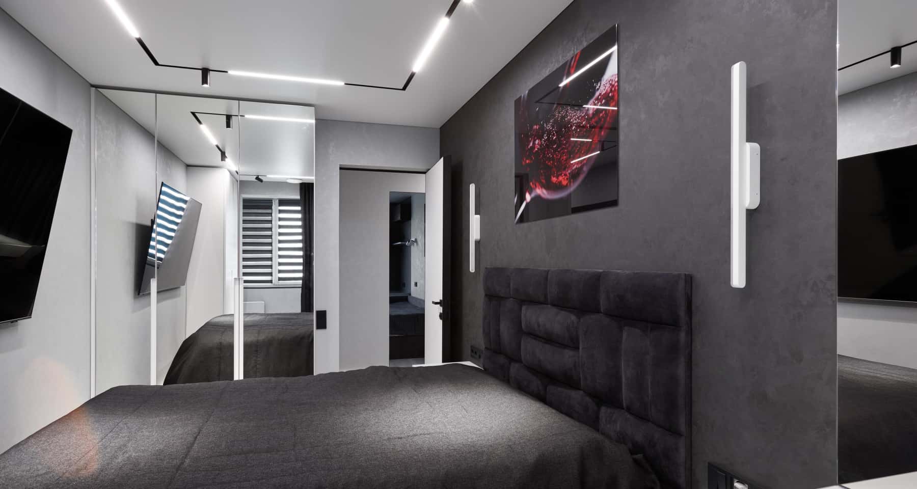 Czarne wnętrze mieszkania z betonem architektonicznym i nowoczesnym oświetleniem LED