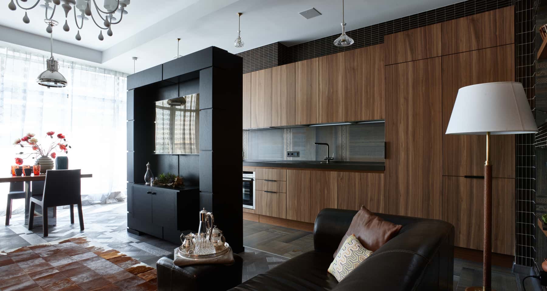 Projekt mieszkania w czarnych tonach z akcentem betonu architektonicznego