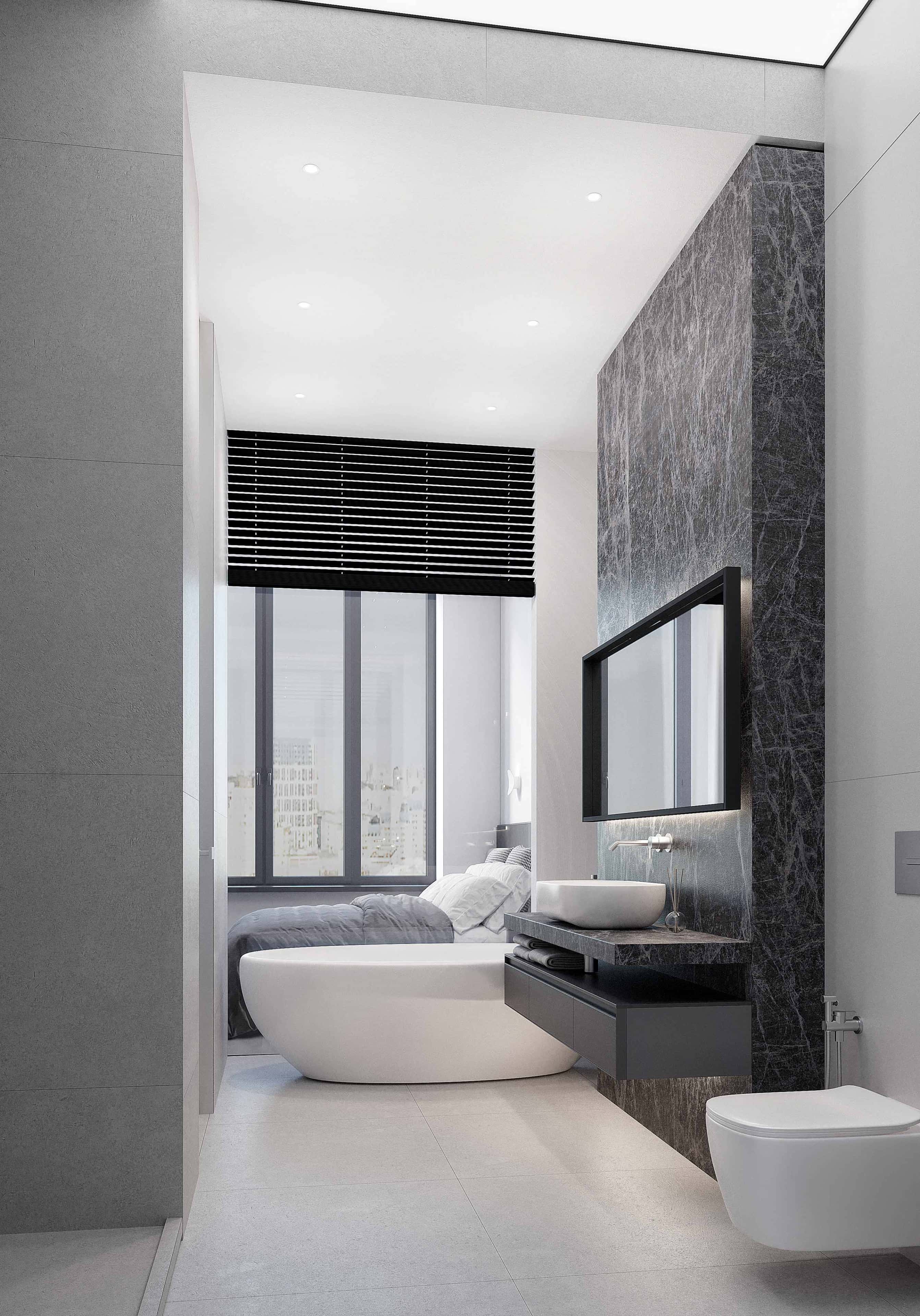 Szare wnętrze mieszkania 2026: minimalistyczny salon z sofą i dywanem w odcieniach szarości.