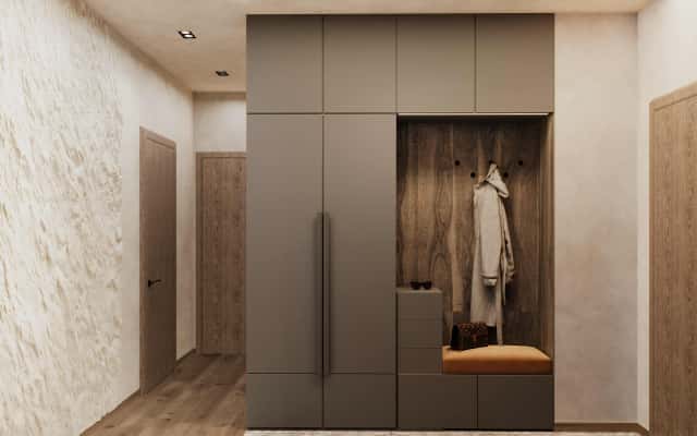 Męskie wnętrze 2026: kuchnia z ciemną kolorystyką i elementami stylu loft.