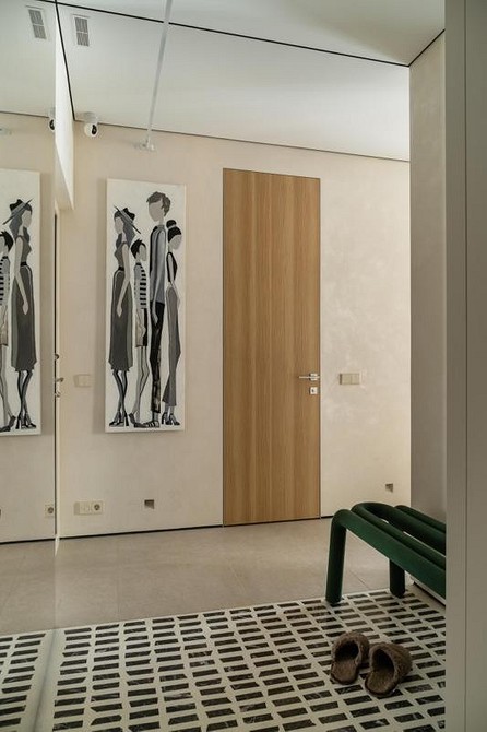 Białe drzwi łazienkowe Minimalistyczne drzwi łazienkowe w kolorze białym, pasujące do każdego wnętrza.