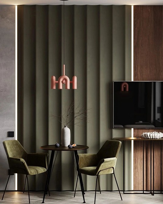 Ściana z paneli gipsowych 3D w małym mieszkaniu: optyczne powiększenie i nowoczesny styl.