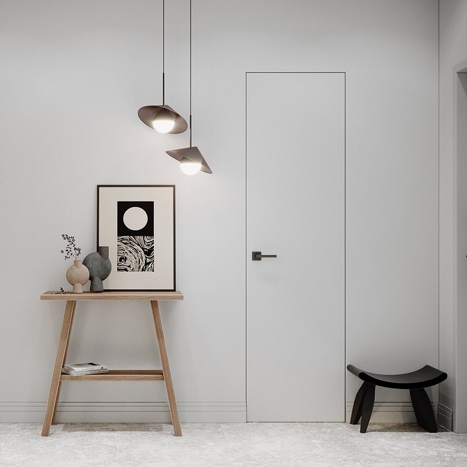Dopasowanie listew: listwy przypodłogowe w kolorze drzwi tworzą harmonijną całość.