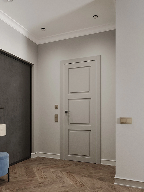 Eleganckie listwy przypodłogowe w kolorze drzwi tworzą spójną aranżację mieszkania.