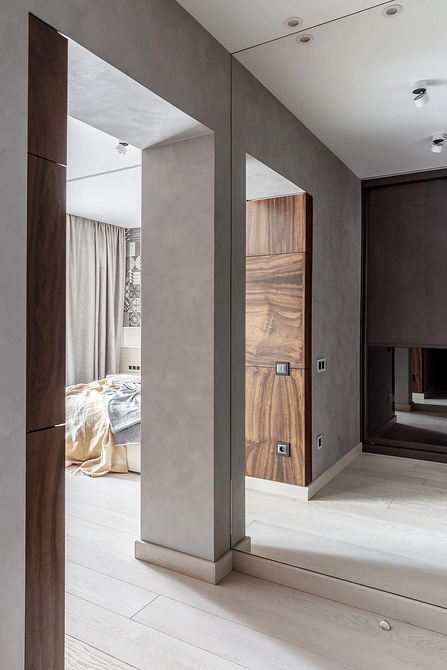 Inspiracja kolorystyczna: listwy przypodłogowe dopasowane do podłogi i ścian w nowoczesnym wnętrzu.