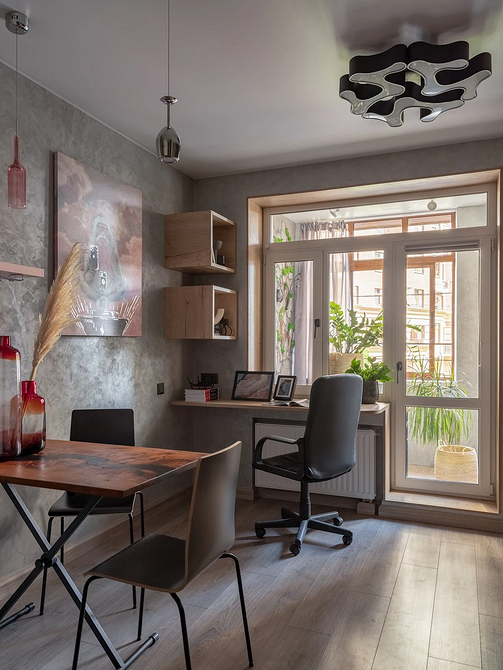 Bielony laminat imitujący drewno Elegancki laminat w odcieniu imitującym bielone drewno, tworzący minimalistyczną przestrzeń.