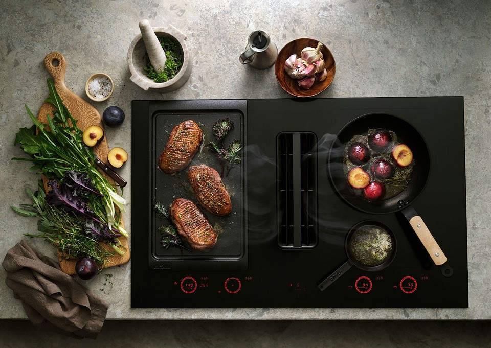 Płyta indukcyjna z okapem 2026: Inteligentne gotowanie z automatycznymi programami i cichą pracą.