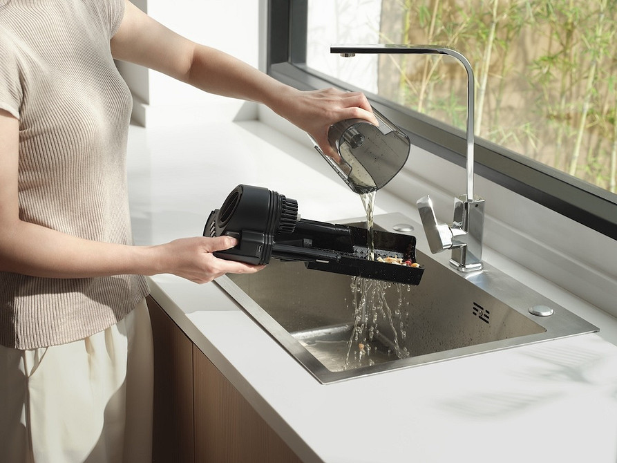 Inteligentny system sprzątania - odkurzacz pionowy z funkcją samoczyszczenia.