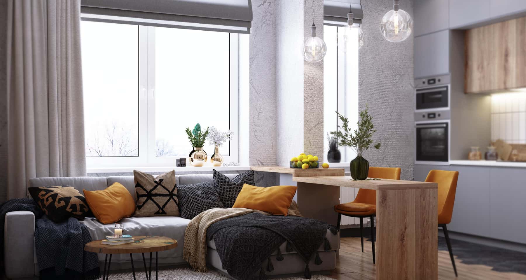 Kuchnia loft z charakterem Nowoczesna szara kuchnia w stylu loft, z industrialnymi lampami i betonową ścianą.