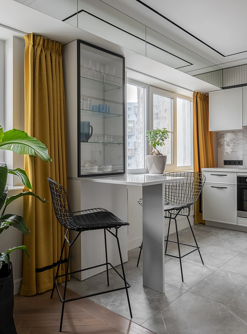 Salon w stylu skandynawskim z szarą podłogą, naturalne materiały, minimalizm.