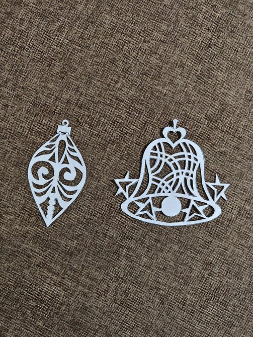 Szablony bożonarodzeniowych wycinanek do pobrania 2026: Idealne ozdoby okienne.