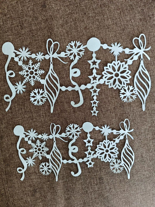 Wycinanki bożonarodzeniowe 2026: kreatywne pomysły na ozdoby okienne DIY z papieru.